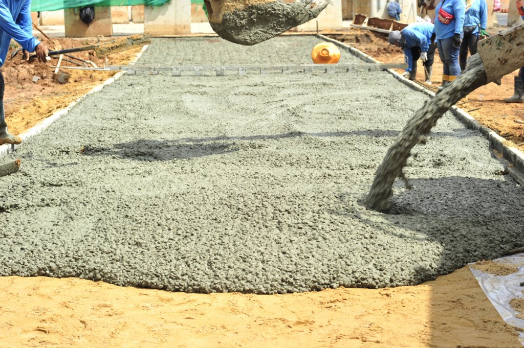 Professional stamped concrete driveway and walkway installation by Specialized Landscape & Construction in Del Mar, California.
