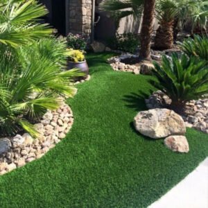 Professional artificial grass installers in Del Mar, CA, completing a luxury backyard turf project.