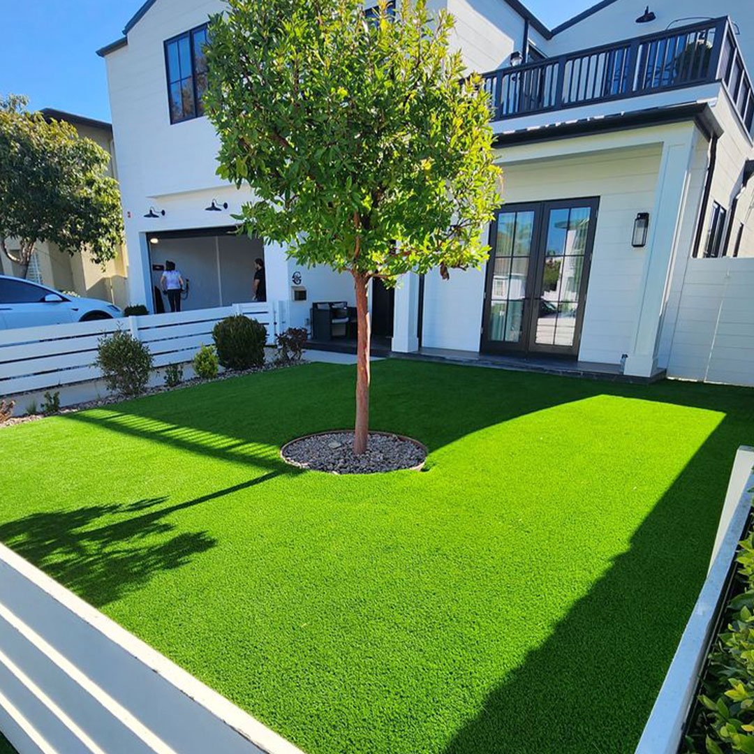 Professional outdoor living contractors near me in Del Mar CA building a custom stone patio and fire pit.